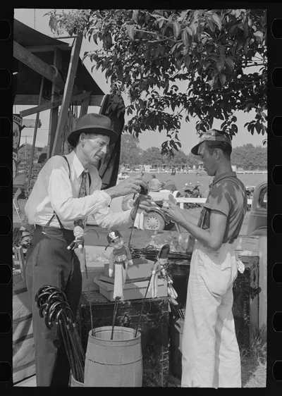 Concessionaire, state fair, Donaldsonville, Louisiana, 1938