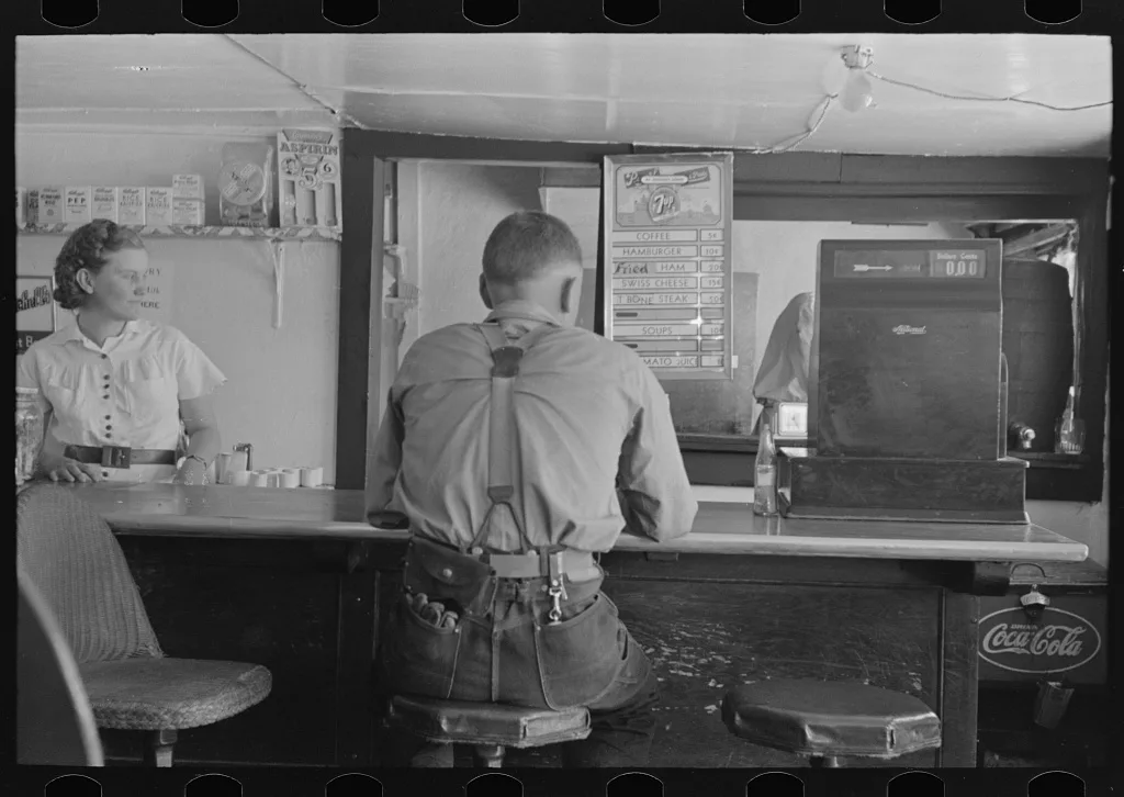 Man in hamburger stand, Alpine, Texas, 1939