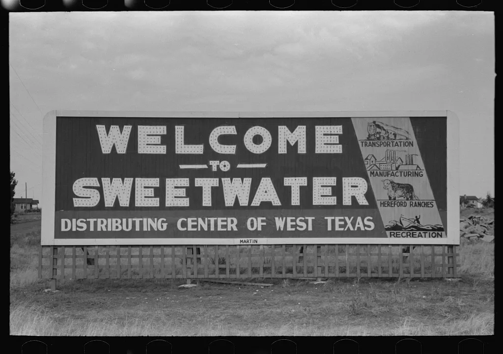 Signboard, entering Sweetwater, Texas, 1939