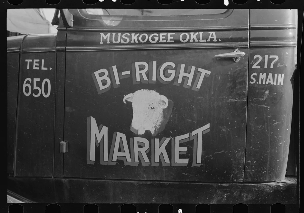 Sign on side of truck, Muskogee, Oklahoma, 1939