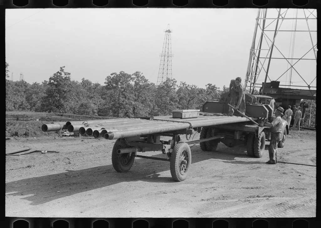 Truck load of pipe, oil field, Seminole, Oklahoma, 1939