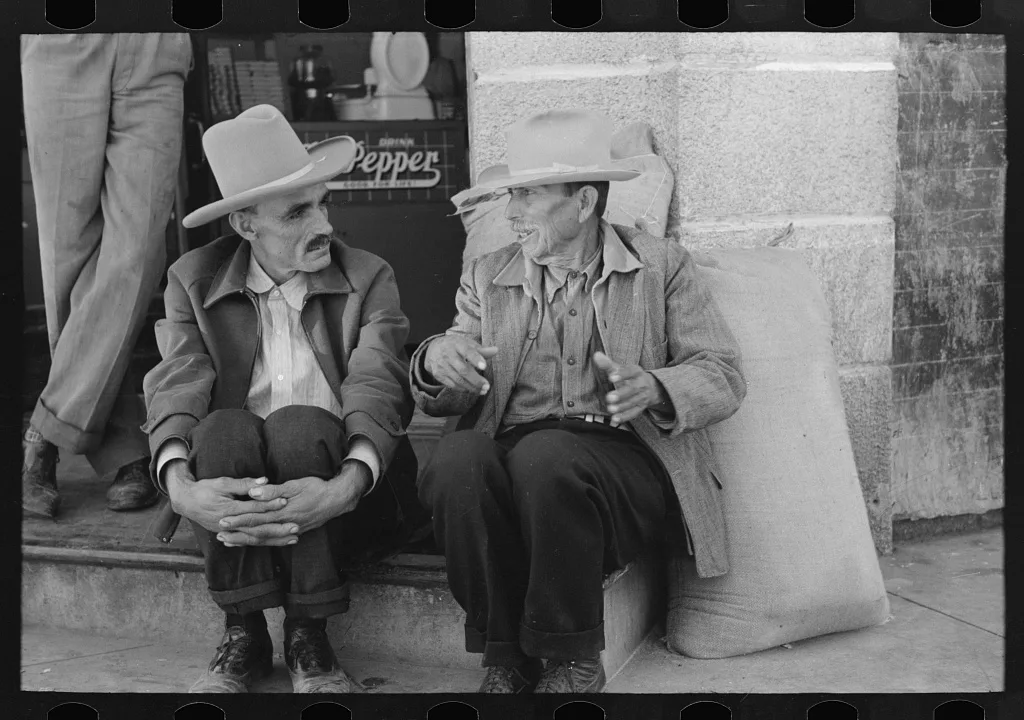 Mexican farmers talking in town, Taylor, Texas, 1939