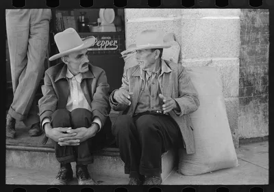Mexican farmers talking in town, Taylor, Texas, 1939