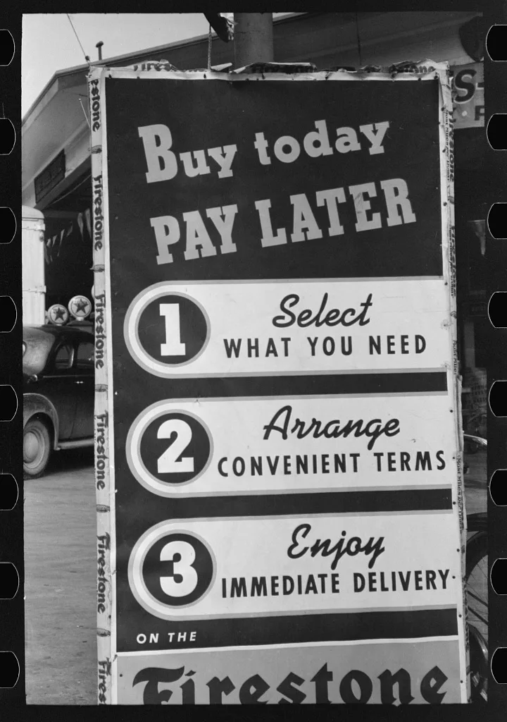 Sign illustrating installment buying, Waco, Texas, 1939