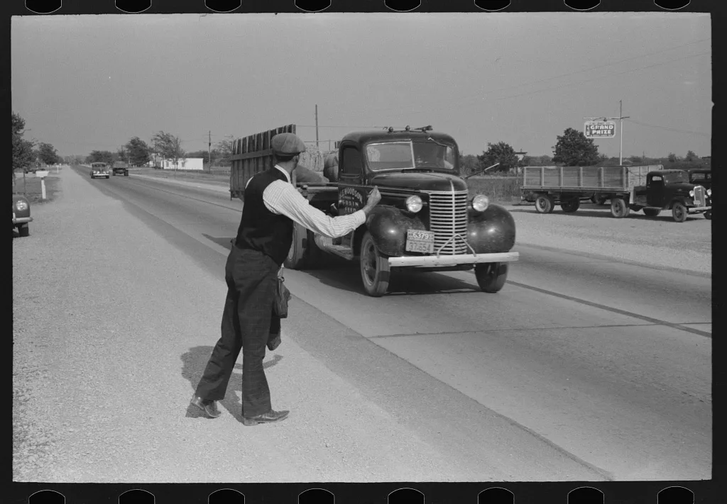 Hitchhiker at city limits of Waco, Texas, 1939