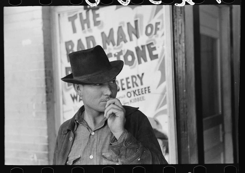 Man in front of movie theater, Waco, Texas, 1939