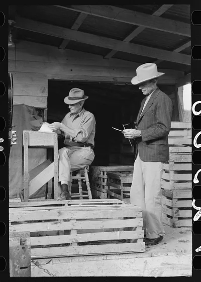 Turkey raiser at unloading platform, Brownwood, Texas, 1939