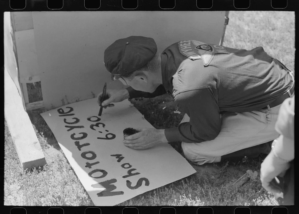 Painting a sign, Fourth of July, Vale, Oregon, 1941