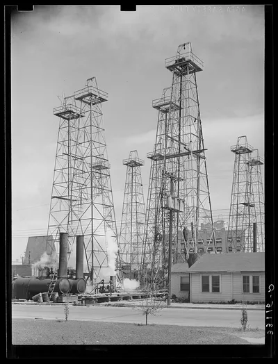 Drilling operations and derricks. Kilgore, Texas, 1939