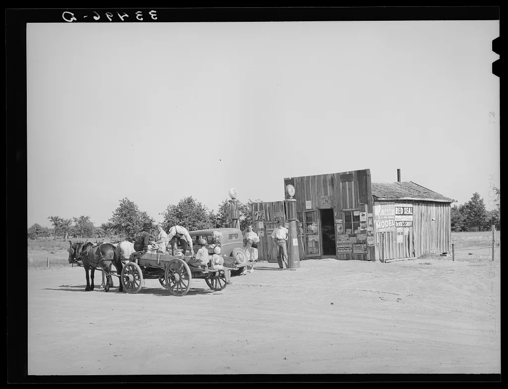 Scene at crossroads grocery store. McIntosh County, Oklahoma, 1939