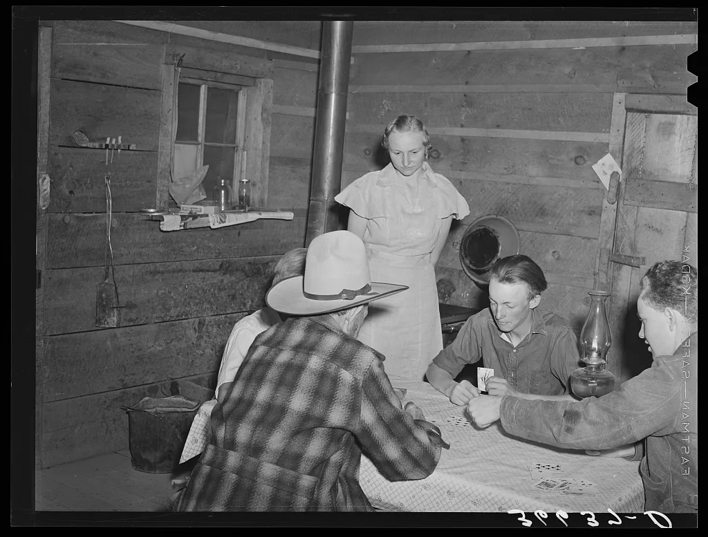 A hand of poker at the Forty-two party. Pie Town, New Mexico, 1940