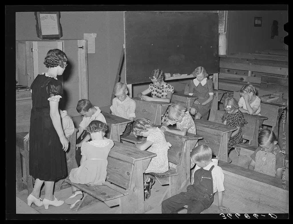 The school day opens with prayer at private school at the Farm Bureau…, New Mexico, 1940