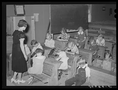 The school day opens with prayer at private school at the Farm Bureau…, New Mexico, 1940