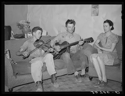 Farmer, his wife, and brother in close harmony. Pie Town, New Mexico, 1940