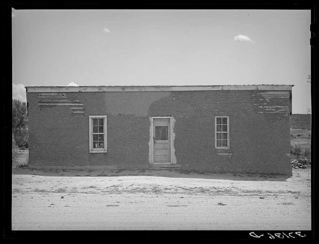 Front of Spanish-American house, Penasco, New Mexico. Notice the…, 1940