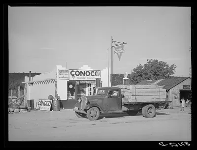 Truck and filling station, Penasco, New Mexico. All supplies come…, 1940