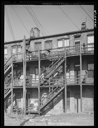 [Untitled photo, possibly related to: Back of apartment house rented…, Illinois, 1941