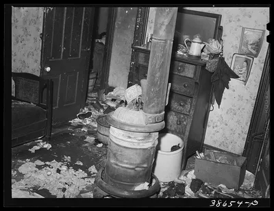 Detail in room of apartment house gutted by fire. This building was…, Illinois, 1941
