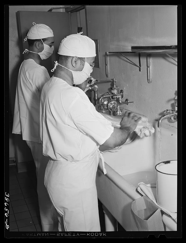 Doctors scrubbing up before operation. Negro hospital, Chicago,…, Illinois, 1941