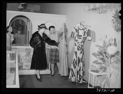[Untitled photo, possibly related to: Dress shop which caters to…, Illinois, 1941