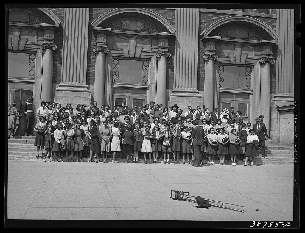 Children at high school being posed for photograph. Southside of…, Illinois, 1941