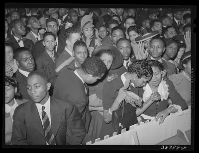 Detail of crowd watching the orchestra at the Savoy Ballroom.…, Illinois, 1941