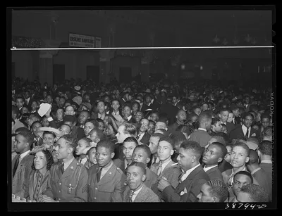 [Untitled photo, possibly related to: Detail of crowd watching the…, Illinois, 1941