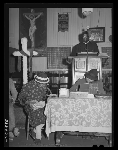 During the services at "storefront" Baptist church on Easter Sunday.…, Illinois, 1941