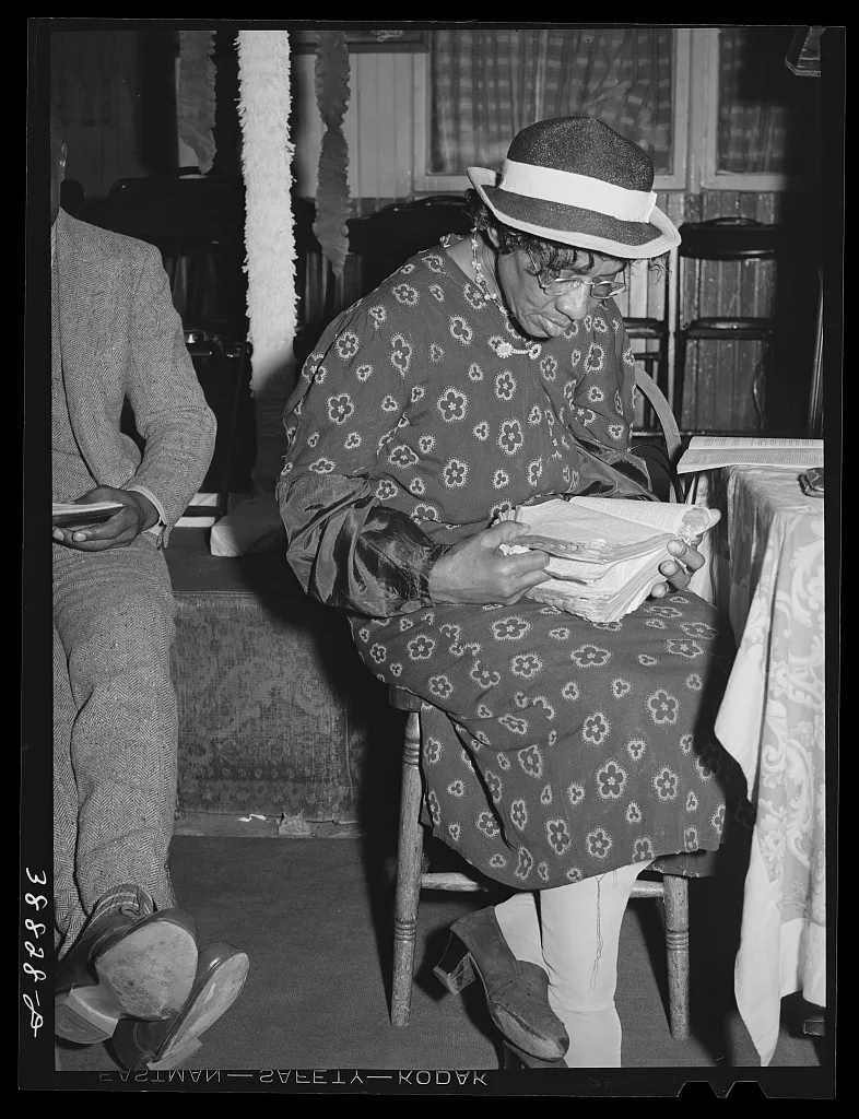 Reading the Bible in the "storefront" Baptist church. Chicago,…, Illinois, 1941