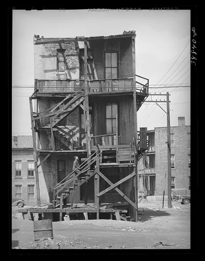 [Untitled photo, possibly related to: Back of multi-family dwellings…, Illinois, 1935