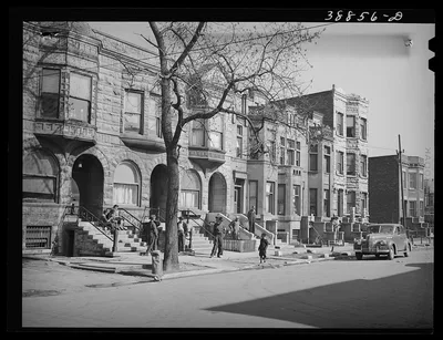 Old brownstone houses now occupied by Negroes in Chicago, Illinois, 1941