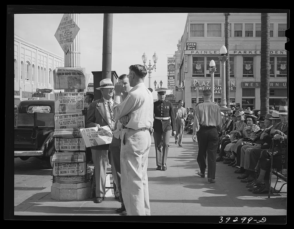 Looking down on square and sidewalk in midtown. San Diego, California, 1941