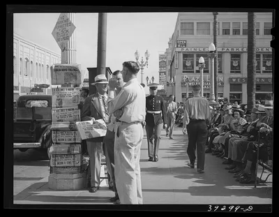 Looking down on square and sidewalk in midtown. San Diego, California, 1941