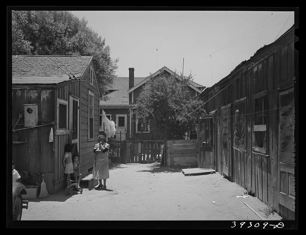 Houses rented to Mexican families with house of landlady in…, California, 1941