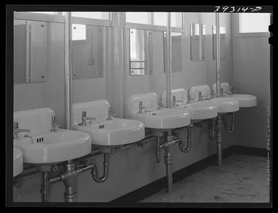 Washbasins at the FSA (Farm Security Administration) trailer camp for…, California, 1941