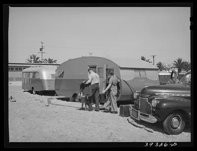 Family moving into trailer at the FSA (Farm Security Administration)…, California, 1941