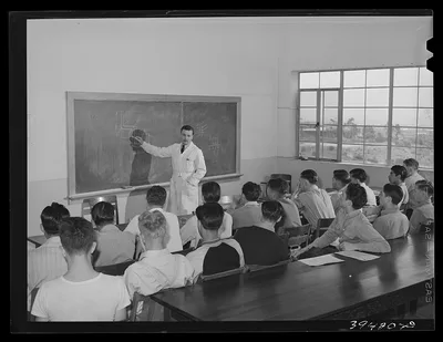 Instructor and class at the vocational school for aircraft…, California, 1941