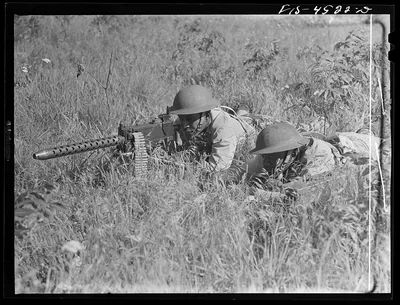 Fort Riley, Kansas. Cavalrymen manning a .30 caliber machine gun, 1942